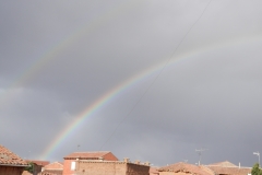 Arco iris doble sobre palomar